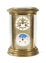 A LARGE 19TH CENTURY FRENCH OVAL FOUR-GLASS MANTEL CLOCK WITH PERPETUAL CALENDAR WORK