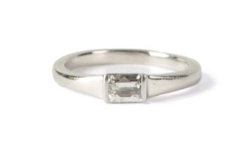 A 0.46CT DIAMOND AND 18CT WHITE GOLD SOLITAIRE RING RETAILED BY BOODLES WITH GIA REPORT