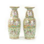 A GOOD PAIR OF 19TH CENTURY CELADON GROUND CANTONESE SLENDER SHOULDERED OVOID VASES