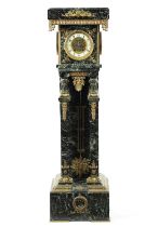 A LATE 19TH CENTURY FRENCH EMPIRE STYLE ORMOLU MOUNTED MARBLE PEDESTAL CLOCK