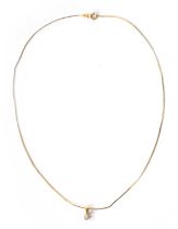 AN 18CT GOLD AND DIAMOND SOLITAIRE NECKLACE