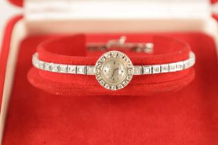 AN 18CT .750 WHITE GOLD LADIES OMEGA DIAMOND ENCRUSTED COCKTAIL WRISTWATCH