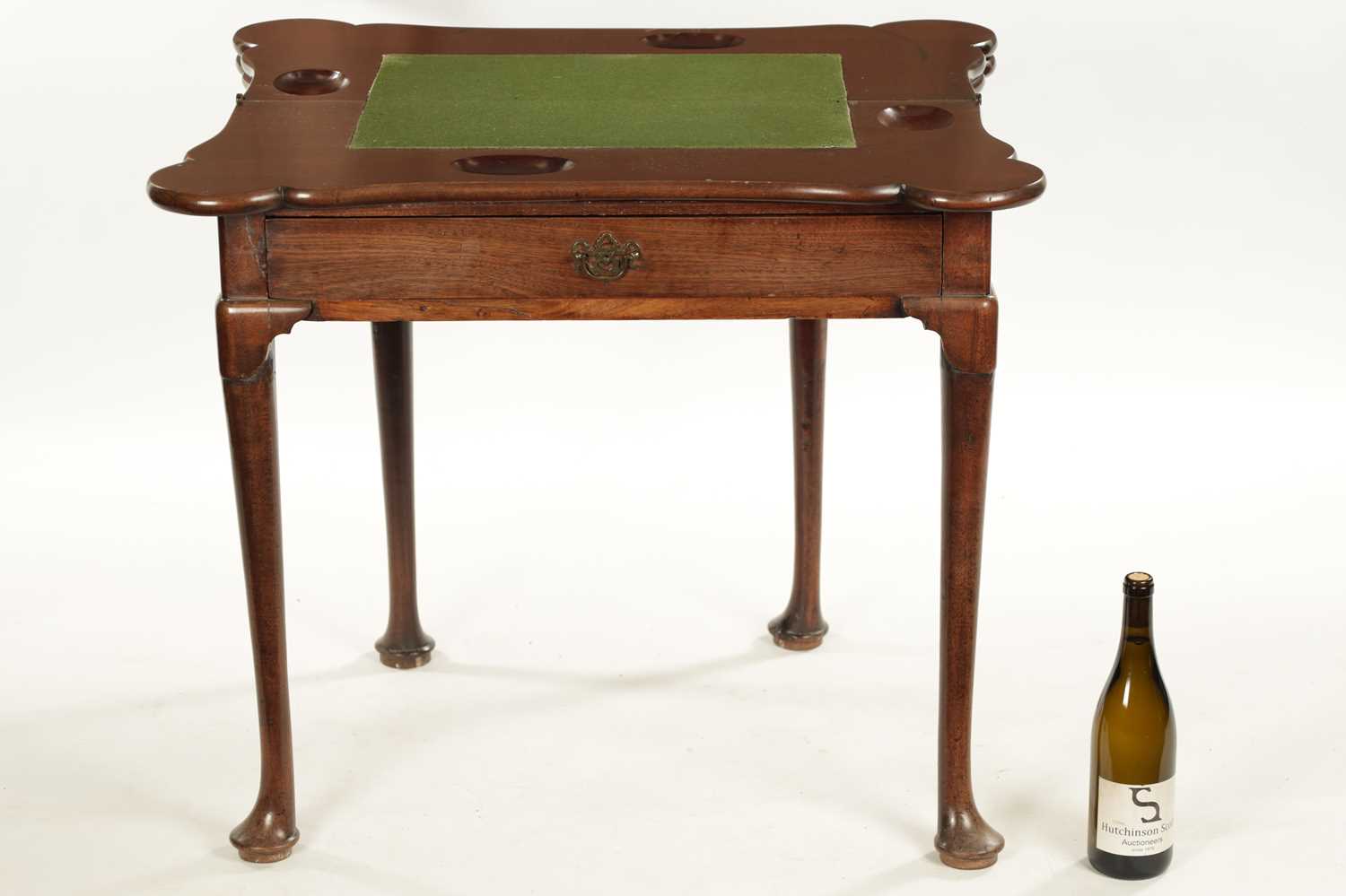 A GEORGE II FIGURED MAHOGANY TRIPLE TOP FOLD-OVER GAMES TABLE - Image 7 of 8