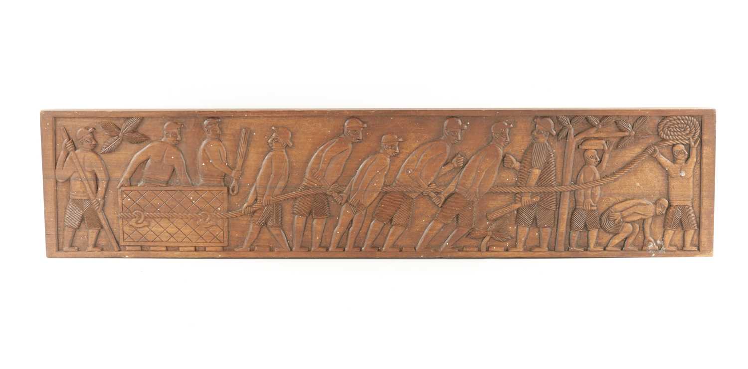 A CAMEROON CARVED HARDWOOD PLAQUE OF SLAVES