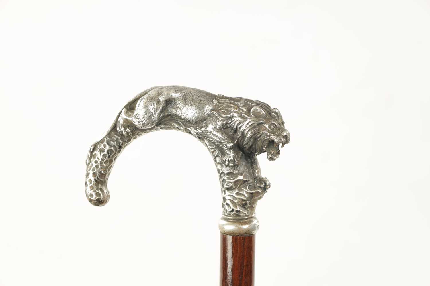 A LATE 19TH CENTURY SILVER TOPPED WALKING STICK MODELLED AS A PROWLING LION - Image 2 of 7