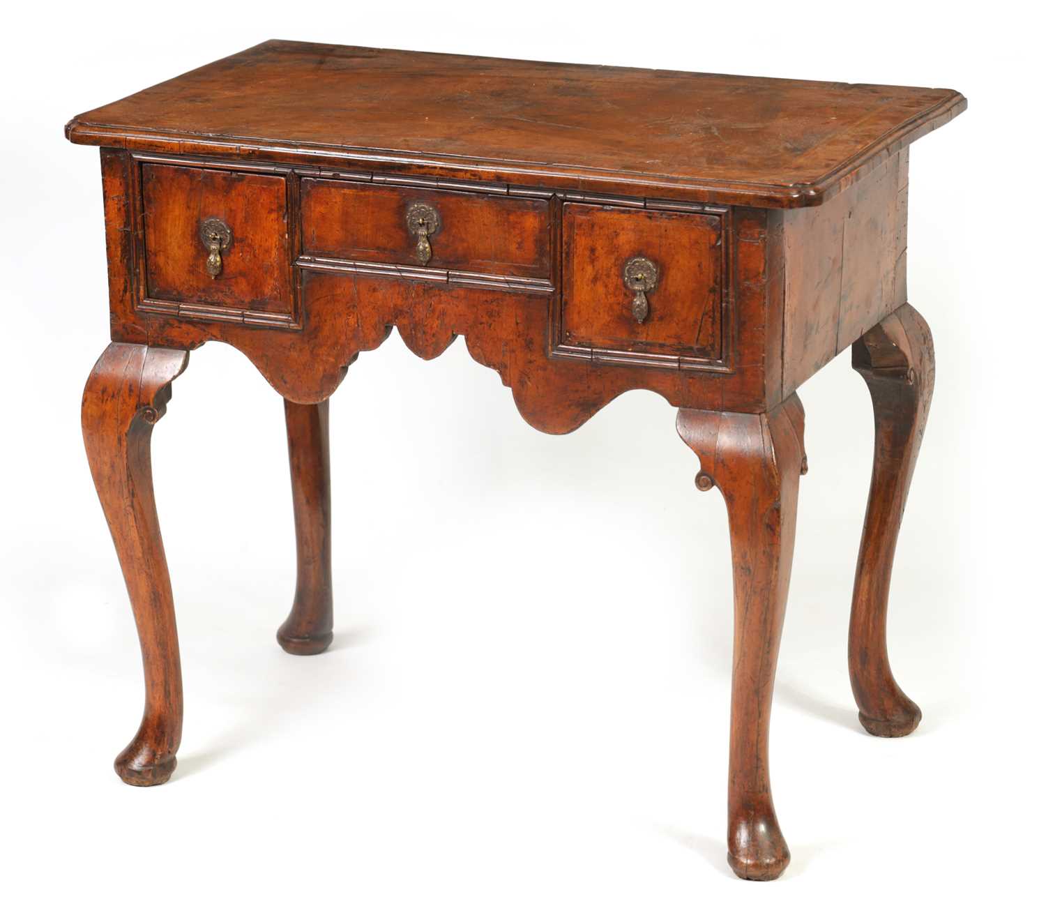 A GEORGE I FIGURED WALNUT AND HERRING-BANDED LOWBOY