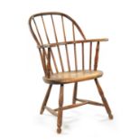 A 19TH CENTURY AMERICAN PRIMITIVE STICK BACK WINDSOR CHAIR