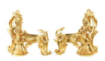 A PAIR OF 19TH CENTURY GILT ORMOLU CHENETS OF ROCOCO CHIPPENDALE DESIGN