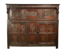 A GOOD LATE 17TH CENTURY OVERSIZED CARVED OAK WESTMORLAND COURT CUPBOARD DATED 1673