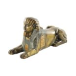 A 19TH CENTURY FRENCH EGYPTIAN REVIVAL BRONZE FIGURE OF A SEATED SPHINX