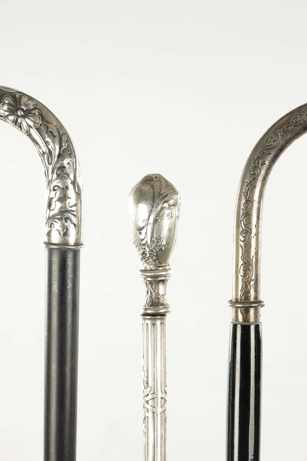 A COLLECTION OF THREE ART NOUVEAU SILVER TOPPED WALKING STICKS - Image 9 of 13