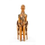 AN UNUSUAL CARVED BOXWOOD FIGURE OF NAPOLEON