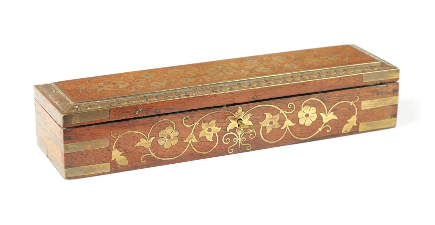 A 19TH CENTURY ANGLO INDIAN BRASS INLAID HARDWOOD PEN AND INK BOX