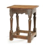 A 17TH CENTURY OAK JOINT STOOL