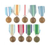 A COLLECTION OF NINE UN SERVICE OF PEACE MEDALS