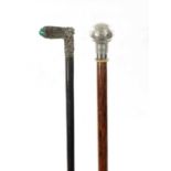 TWO 19TH CENTURY CHINESE SILVER AND STONE-TOPPED WALKING STICKS