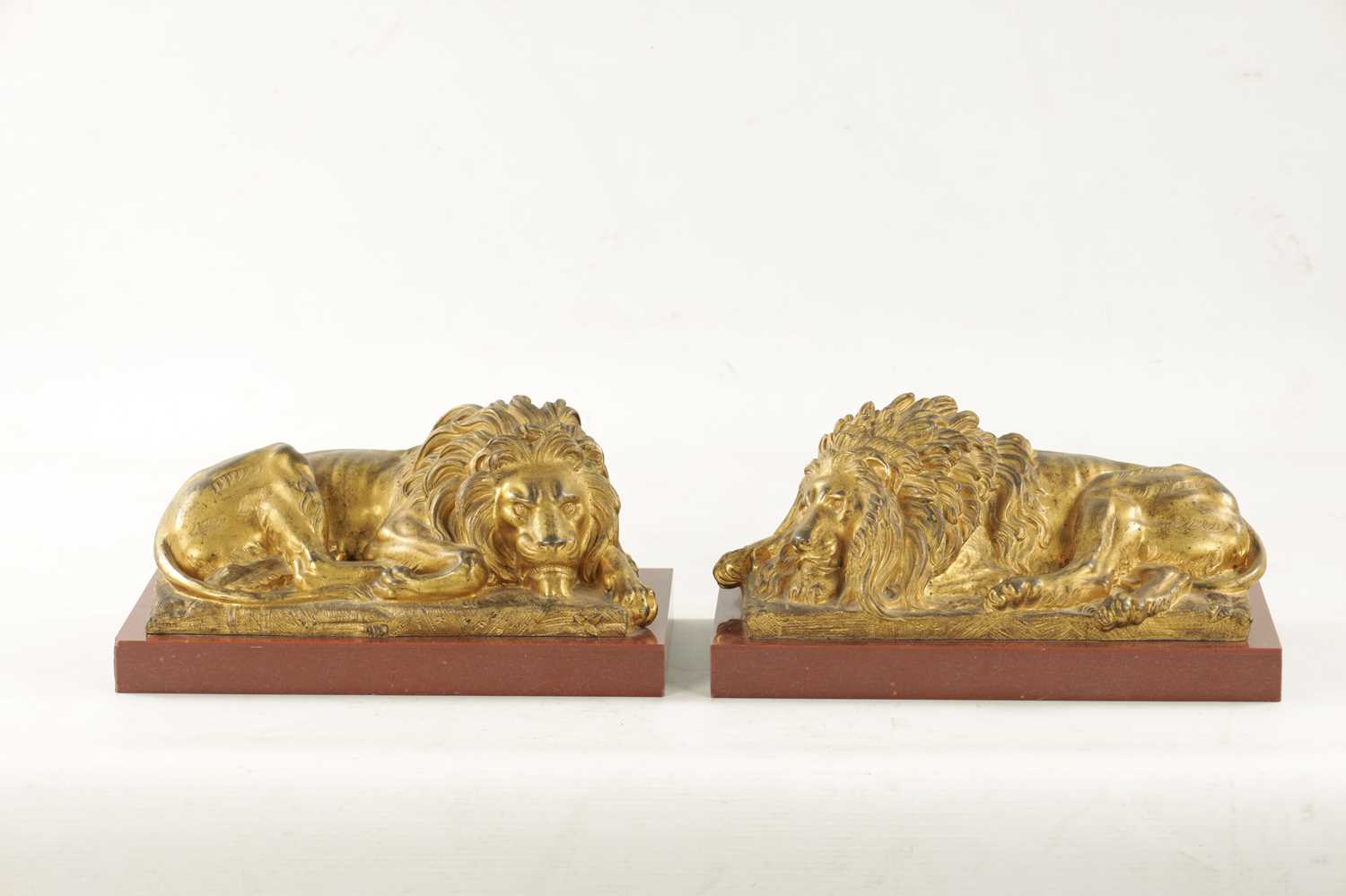 A PAIR OF LATE 19TH CENTURY GILT BRONZE RECUMBENT LIONS - Image 2 of 11