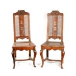 A PAIR OF EARLY 18TH CENTURY WALNUT BERGERE SIDE CHAIRS