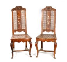 A PAIR OF EARLY 18TH CENTURY WALNUT BERGERE SIDE CHAIRS