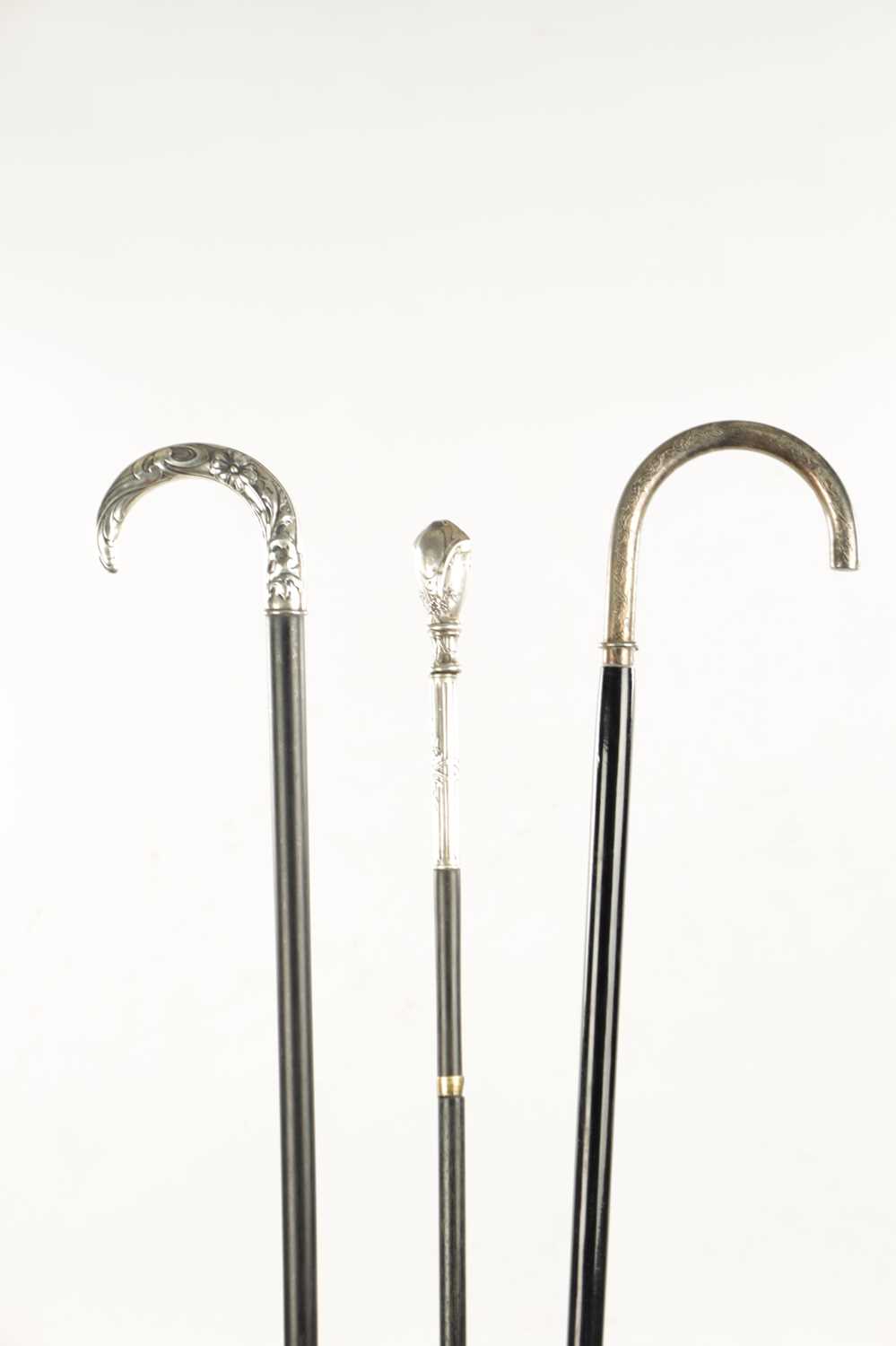 A COLLECTION OF THREE ART NOUVEAU SILVER TOPPED WALKING STICKS - Image 4 of 13