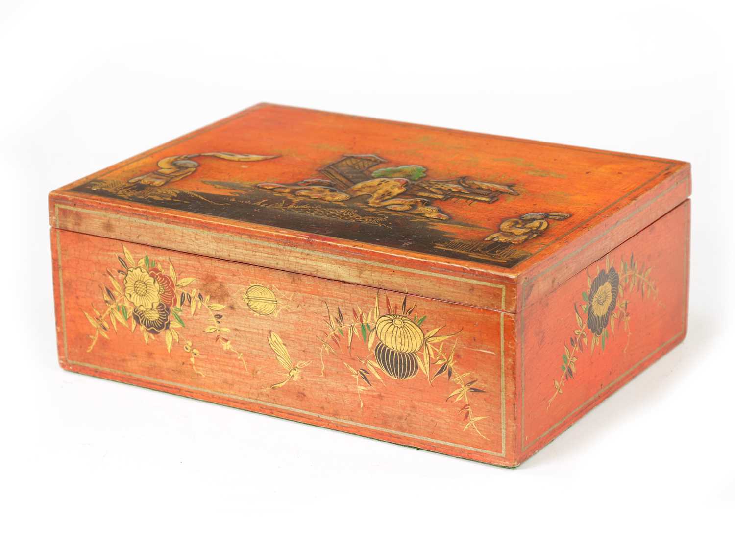 A 19TH CENTURY RED LACQUER AND CHINOISERIE DECORATED BOX