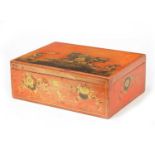 A 19TH CENTURY RED LACQUER AND CHINOISERIE DECORATED BOX