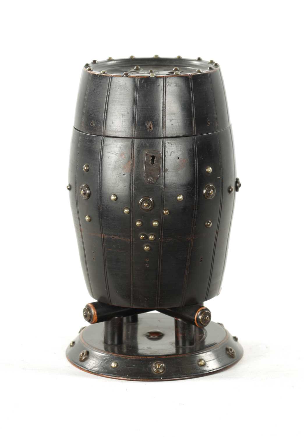 A 19TH CENTURY EBONISED CARVED WOOD TEA CADDY IN THE FORM OF A BARREL