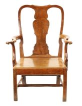 A LARGE EARLY 18TH CENTURY WALNUT SPLAT BACK COUNTRY ARMCHAIR