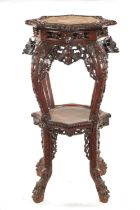 A 19TH CENTURY CHINESE CARVED HARDWOOD JARDINIERE STAND