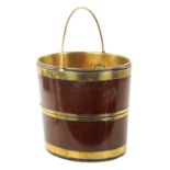 A GEORGE III OVAL MAHOGANY BRASS BOUND OYSTER BUCKET