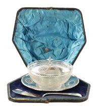 A VICTORIAN SILVER BUTTER DISH IN FITTED LEATHER CASE