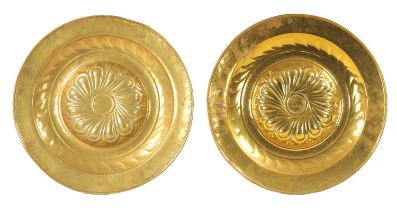 A PAIR OF 17TH CENTURY BRASS ALMS DISHES