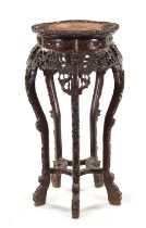 A 19TH CENTURY CHINESE CARVED HARDWOOD JARDINIERE STAND