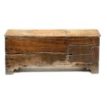 A RARE 17TH CENTURY BOARDED OAK COFFER