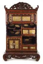 A FINE JAPENESE MEIJI PERIOD CARVED HARDWOOD SHIBIYAMA COLLECTOR’S CABINET