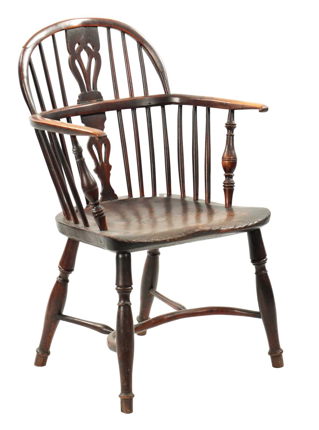 AN EARLY 19TH CENTURY YEW WOOD LOW BACK WINDSOR CHAIR
