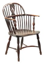 AN EARLY 19TH CENTURY YEW WOOD LOW BACK WINDSOR CHAIR