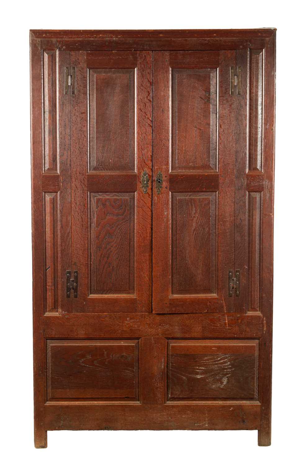 A SMALL EARLY 18TH CENTURY OAK PANELLED CUPBOARD