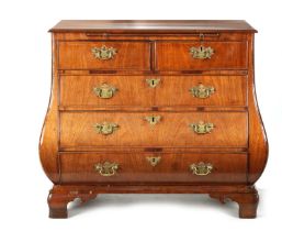 AN 18TH CENTURY FIGURED MAHOGANY BOMBE SHAPED CHEST OF DRAWERS