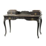 A 19TH CENTURY CARVED COROMANDEL INDO-PORTUGUESE WRITING DESK