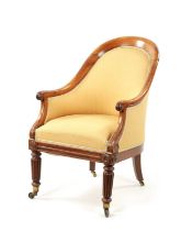 A REGENCY MAHOGANY LIBRARY TUB CHAIR IN THE MANNER OF GILLOWS