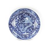 A CHINESE BLUE AND WHITE PORCELAIN DRAGON BOWL