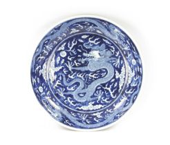 A CHINESE BLUE AND WHITE PORCELAIN DRAGON BOWL