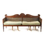 AN UNUSUAL REGENCY CAMPHOR WOOD CAMPAIGN SETTEE