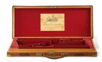 A LATE 19TH CENTURY BRASS BOUND LEATHER SHOTGUN CASE BY BOSS AND C0.