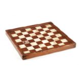 A 19TH CENTURY CHINESE SIMULATED BAMBOO CARVED HARDWOOD AND MOTHER OF PEARL CHEQUERED GAMES BOARD