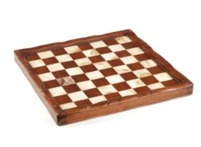 A 19TH CENTURY CHINESE SIMULATED BAMBOO CARVED HARDWOOD AND MOTHER OF PEARL CHEQUERED GAMES BOARD