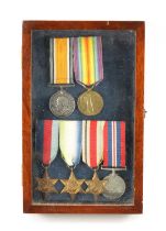 A CASED GROUP OF 1ST AND 2ND WORLD WAR MEDALS
