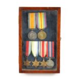 A CASED GROUP OF 1ST AND 2ND WORLD WAR MEDALS