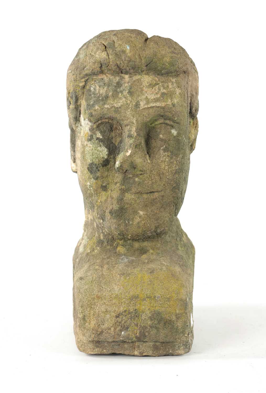 AN EARLY CARVED STONE BUST